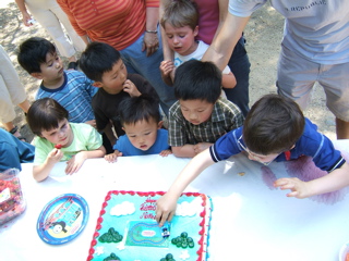 Kids around the Cake